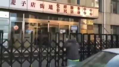 Servitude: Chinese man get down on knees bowling and yowling as mandatory covid tests are eliminated and lockdowns lifted