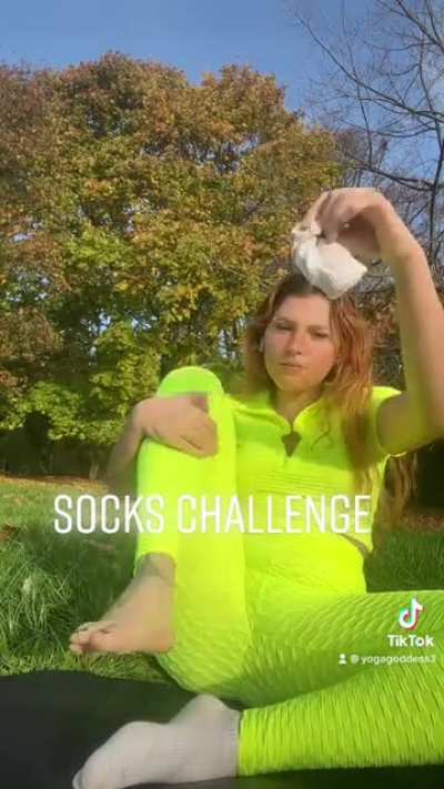 Removing socks and showing cute soles