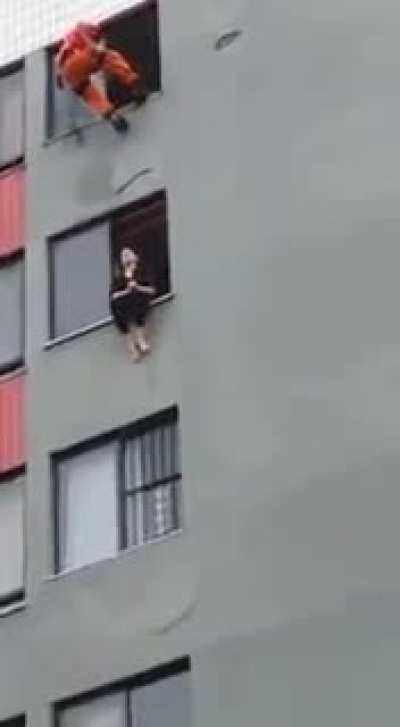 Fireman saves a suicidal person, via kick to the face!