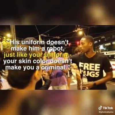 This man started a project called Free Hugs (freehugsproject.com). Here he is communicating his ideas with other protesters.