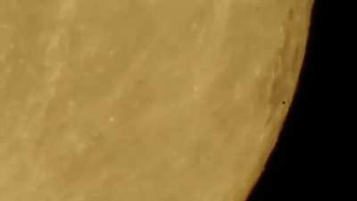 Fleet of UFOs flying across the moon