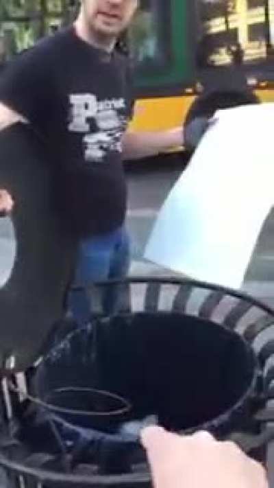 Idiot trying to destroy LGBT poster