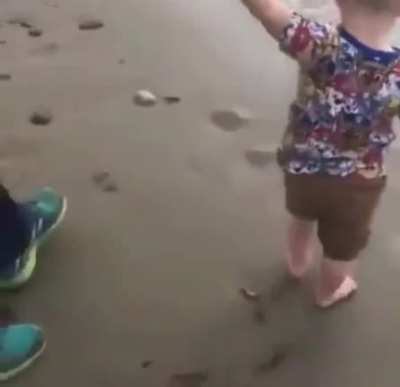 Kids first time at the beach