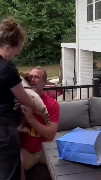 Dad breaks down into tears after family surprises him with new puppy