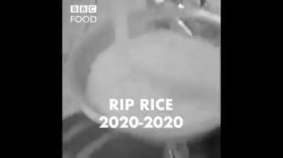 Asian watches rice being cooked improperly