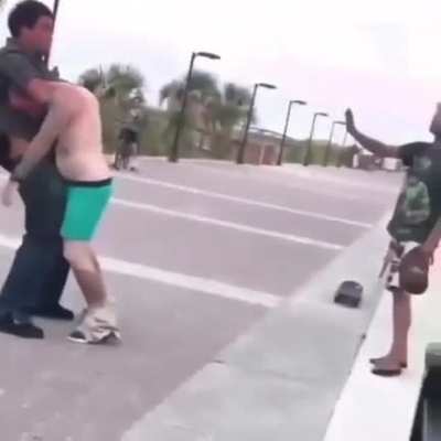 Insane Parler racist spits on black guy. Black guy takes him out in seconds. Cherry on top: He loses his pants.