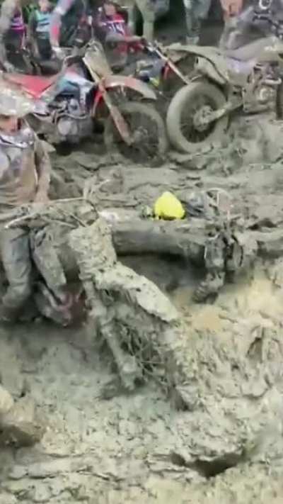 Thousands of off-road motorcycle riders stuck in mud