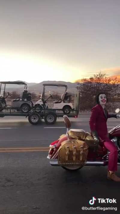 This motorcyclist dressed as the Joker