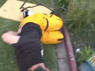 Backyard wrestlers jump off rooftop