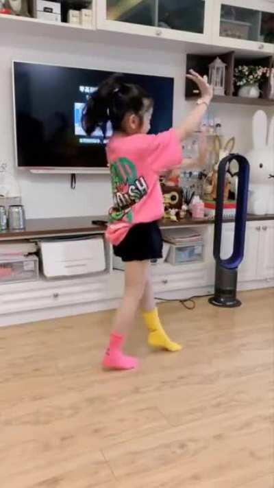 This girl can perfectly mimic various dance moves with precision and skill.