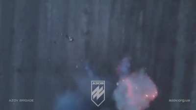 Russian infantry hit by explosive munition in a field