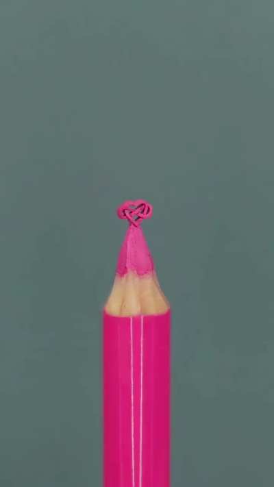 Carving tiny figurines on the tip of a pencil.