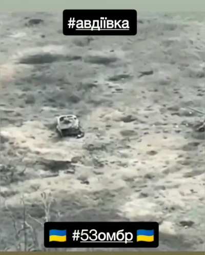 Several Russians are hit by an FPV drone while taking cover behind a wrecked BMP. Avdiivka, November 2023.