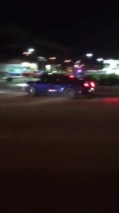 Two Idiot Mustang drivers leave car meet in typical fashion.