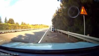 An suv is trying to exit from the passing lane