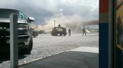 Holy shit war zone type of feeling here. This was in Tamaulipas Mexico. Mexican military against sicarios