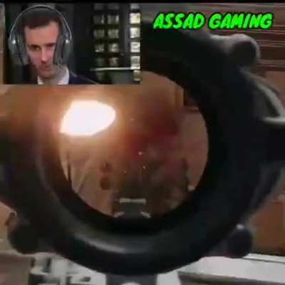Evil dictator Bashar Al Assad playing video g#me
