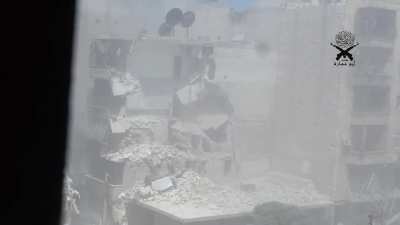 FSA engineers open up the wall of an SAA fighting position using an improvised cannon - Salah al-Din Neighborhood, Aleppo - 2015