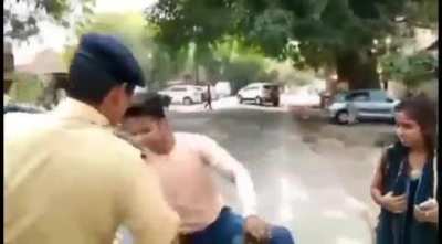 boy used to harass a girl on road today he caught red handed by the police officer and officer beat the shit out of him