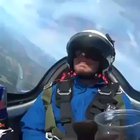 Pouring a can of red bull whilst upside down in a jet
