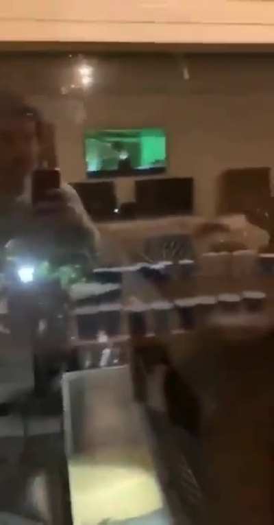Guys in apartment express support for protesters, proceeds to get windows smashed.