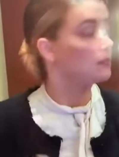 Amber Heard doing a bump of coke on the stand