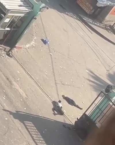 Gazans trying to rescue an injured child while the IOF sniper shots everyone