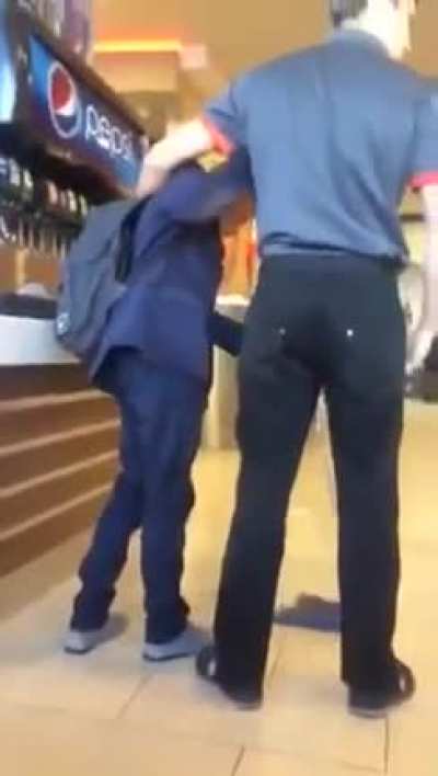 Burger King employee slaps kid who was making a mess and makes him mop up