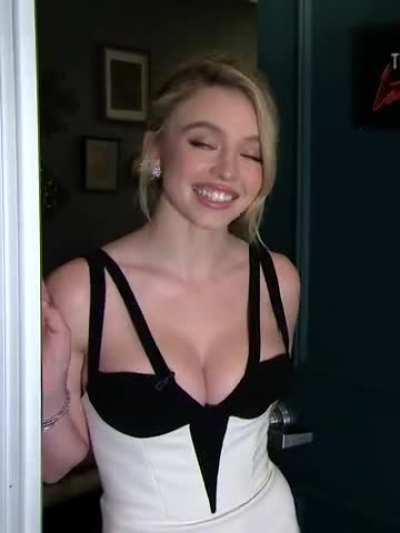At her door