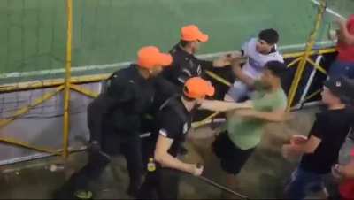 Brazilian football fan vs some cops