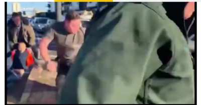 Angry motorists drag protesters off Wandsworth Bridge to let ambulance through