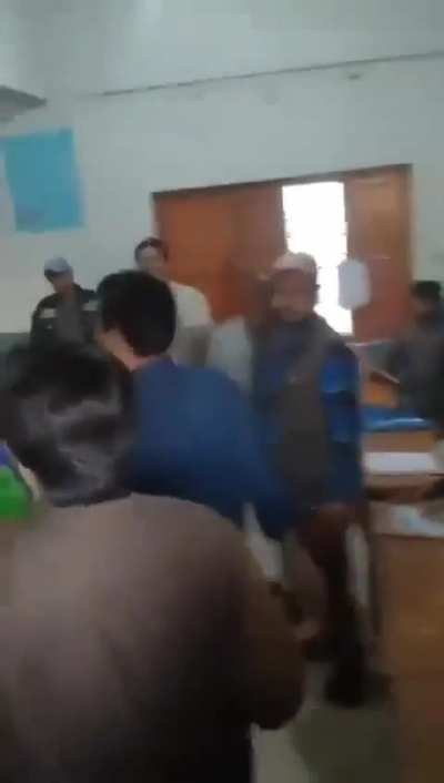 A candidate kicks in gate to destroy Ballots in Pakistan's 2024 General Elections
