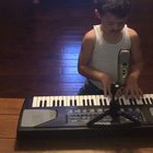 My son acting out Live Aid. Queen is his favorite band.