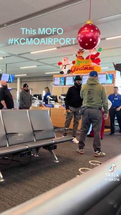 Gentleman at airport has disagreement with staff