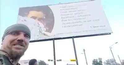 Ua pov While ripping off Russian billboards in retaken cities, Ukrainian soldiers found a quote by Taras Shevchenko that says 