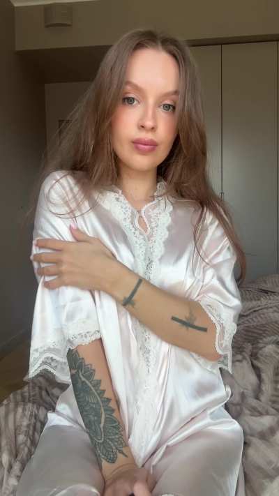 I love how this satin robe hugs my delicate body