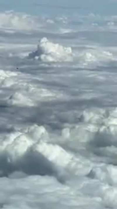 Pilot spots cube/sphere like UFO