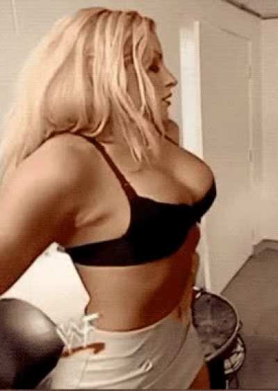 Trish Stratus Takes it Off