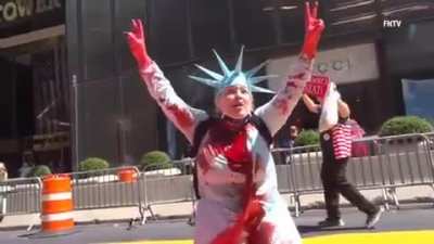 Lady Liberty herself vandalizes BLM mural. She may or may not have been hearing orange voices in her head.
