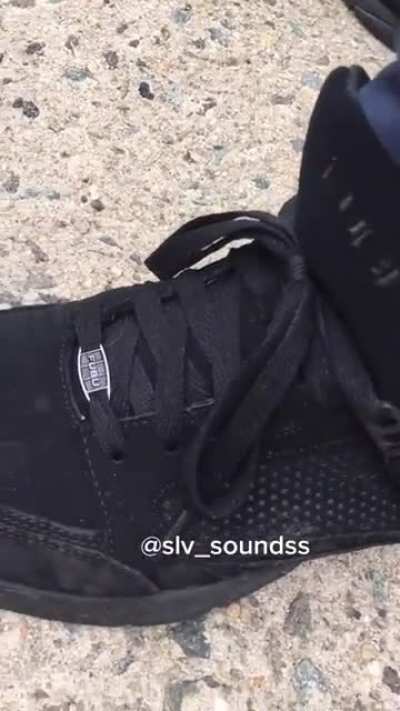 Guy roasts random dudes shoes while singing