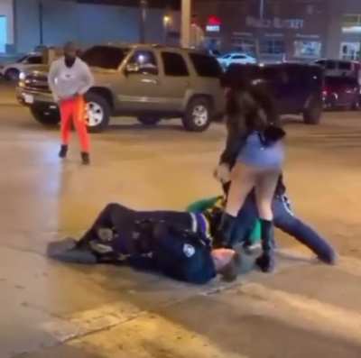 Women twerks in officers face.