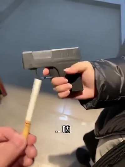 Holding and lighting your cigarettes with a gun