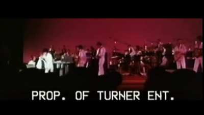 During band introductions Elvis accidentally knocks over his Gatorade by pulling on the microphone cord. His reaction is hilarious. He sings, 
