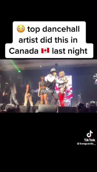 Artist hit with with mic on stage