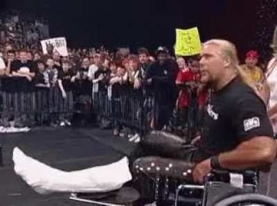 Kevin Nash gets up from wheelchair