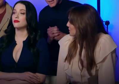 Elizabeth Olsen looking at Kat Dennings like all of us