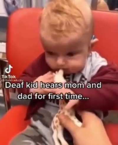 Deaf kid hears mom and dad for the first time
