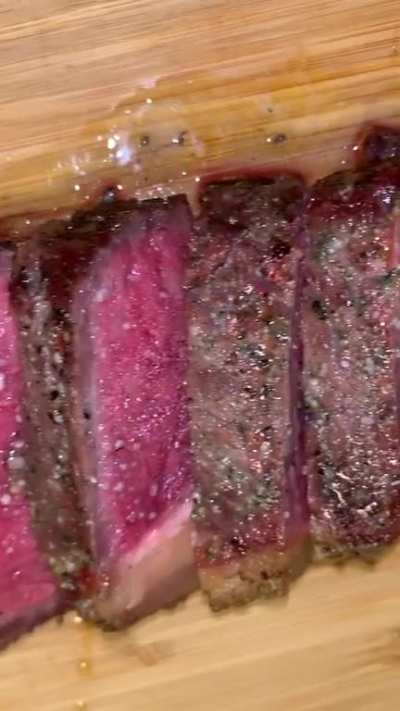 Reverse sear ribeye! Seasoned with homemade rosemary salt and freshly ground pepper. Smoked at 225F and then seared until 130F internal. No idea why the video is upside down but the steak came out great.