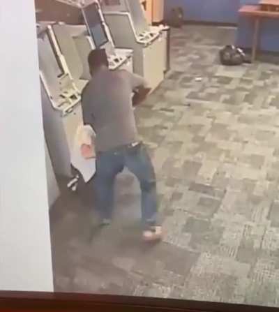 Man attacked by black man with a hatchet in a Manhattan Financial District ATM without provocation