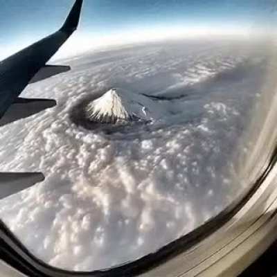 Clouds Moving Around Mt Fuji, From Plane.